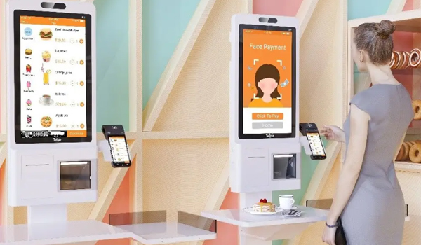 Kiosk thông tin có thiết kế dạng trụ đứng, tích hợp màn hình cảm ứng, máy in hoá đơn,...